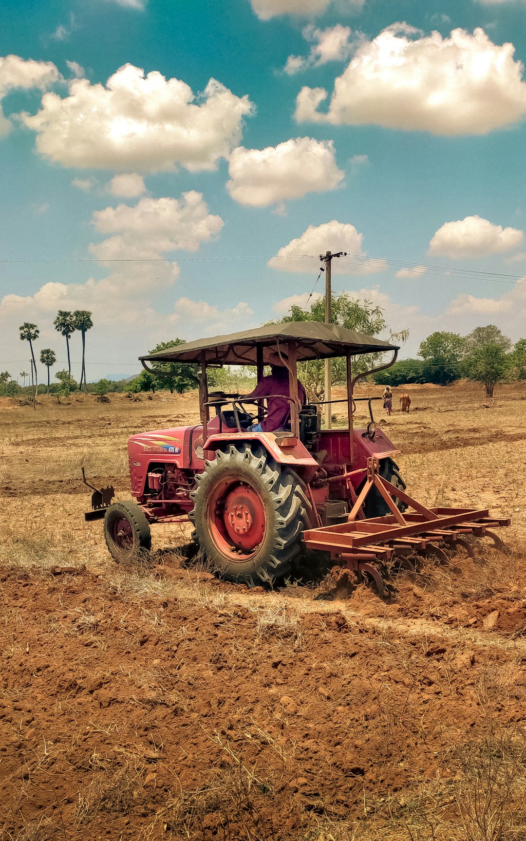 Farm equipment working on a field